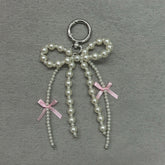 Korean Pearl Bow Phone Charm – Stylish & Feminine