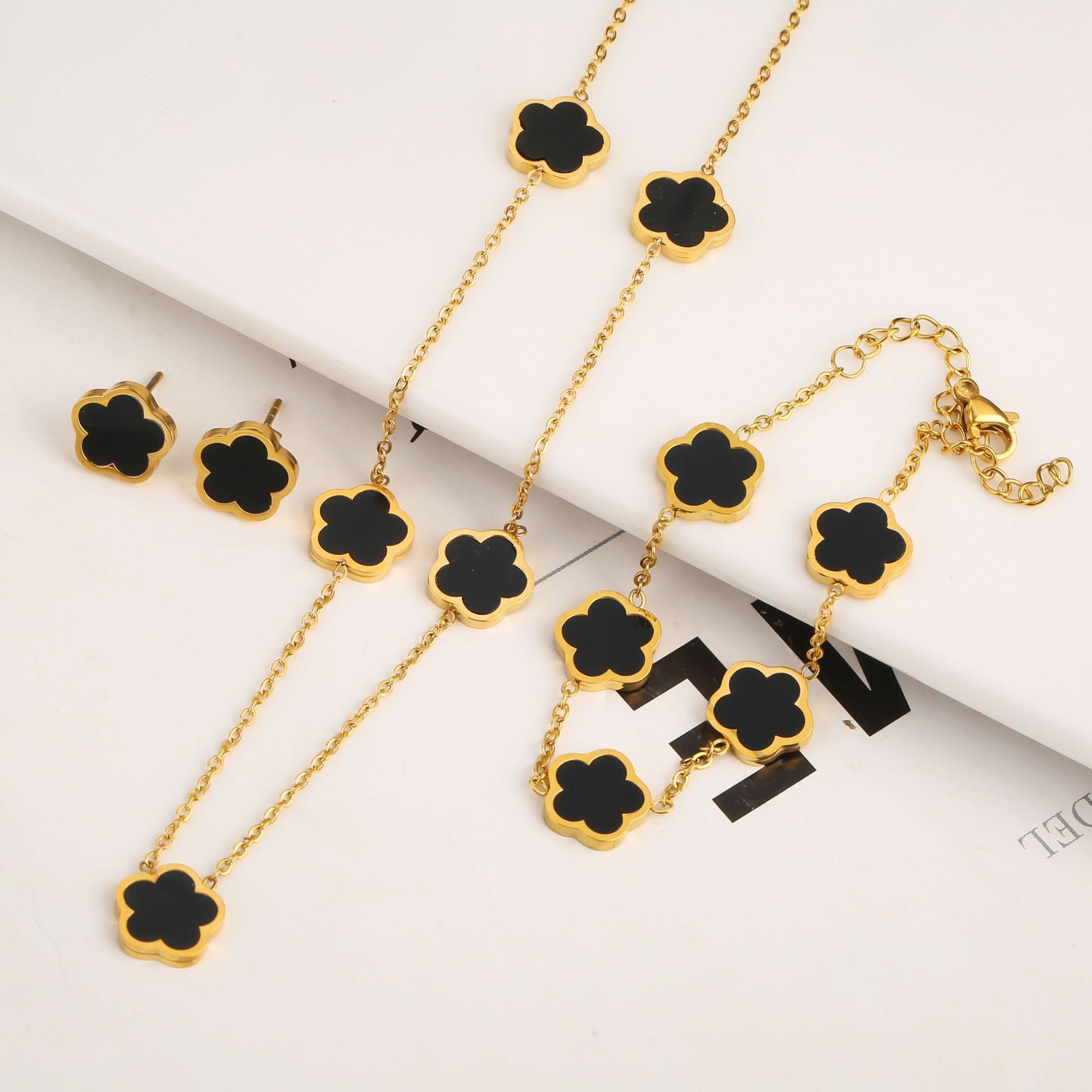 Titanium Steel Five-Petal Flower Jewelry Set – Earrings, Bracelet & Necklace