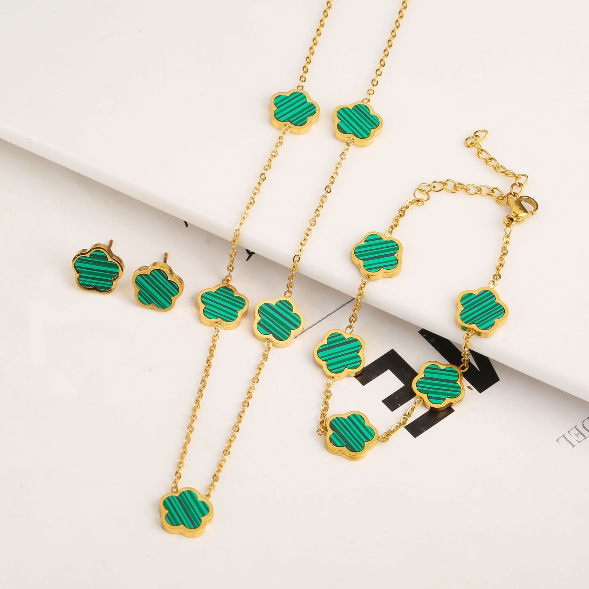 Titanium Steel Five-Petal Flower Jewelry Set – Earrings, Bracelet & Necklace