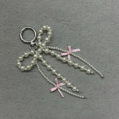 Korean Pearl Bow Phone Charm – Stylish & Feminine