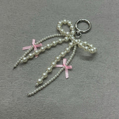 Korean Pearl Bow Phone Charm – Stylish & Feminine