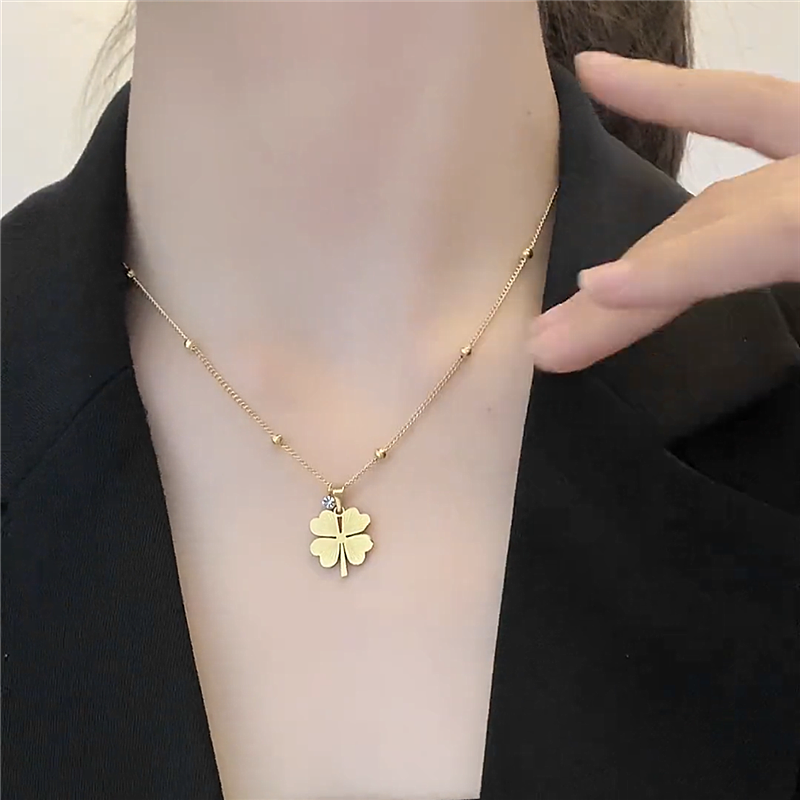 Lucky Four-Leaf Clover Necklace – Hollow Titanium Steel with Crystals