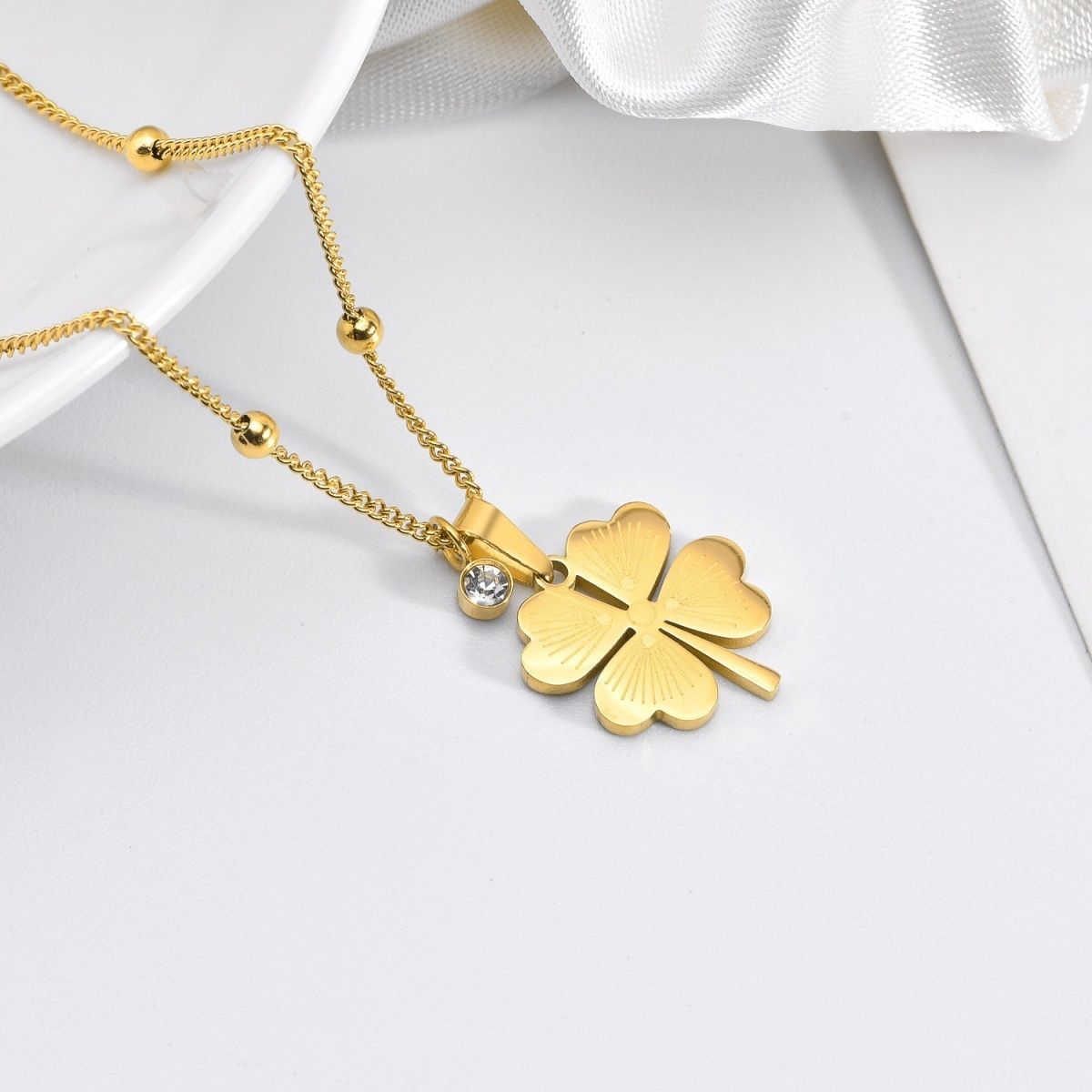 Lucky Four-Leaf Clover Necklace – Hollow Titanium Steel with Crystals